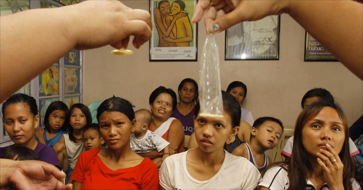 Contraception classes being taught to Filipino girls.